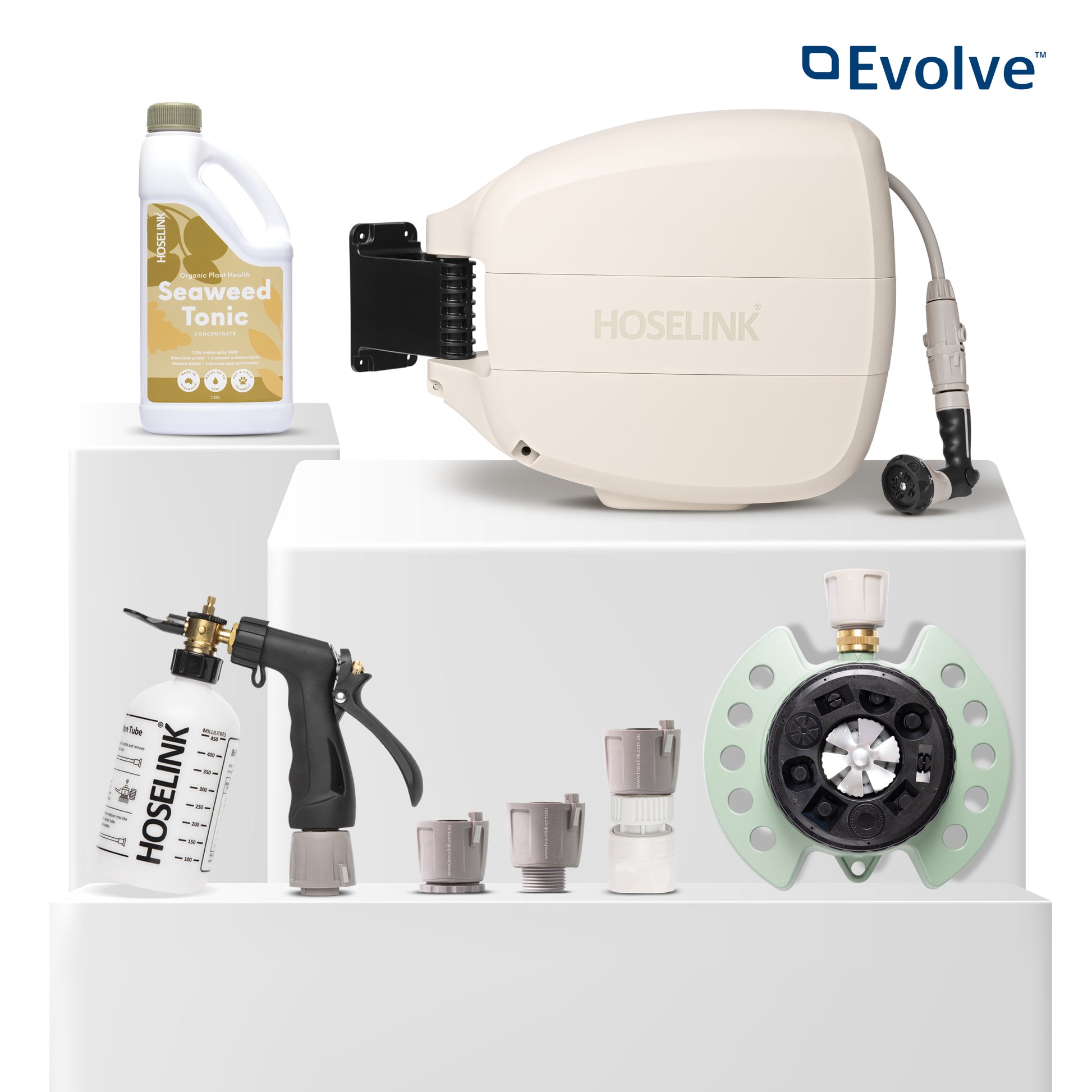 Beige Evolve Retractable Hose Reel, 9-Pattern Sprinkler, Fertiliser Spray Mixer, Sea Weed Tonic and Hose Fittings on a white background